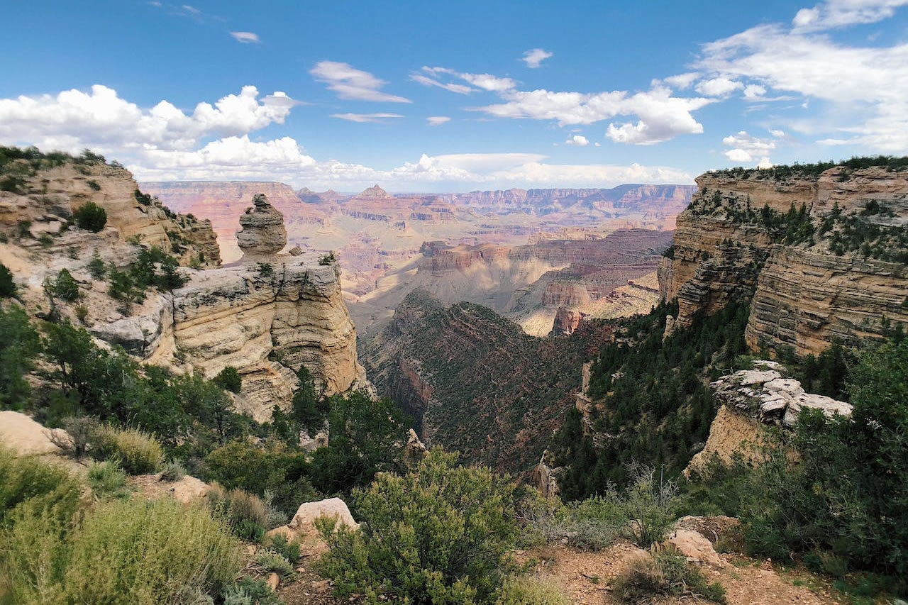 Image of the Grand Canyon from the bottom looking up. The canyon is massive, and the walls are steep.